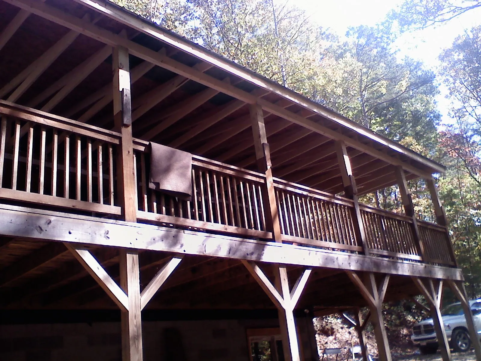 Timber framing under a new elevated porch and deck — Roof Leak Repair in Oregon by Roofing Brothers